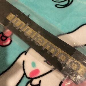 Lululemon Black and Gold Keychain
